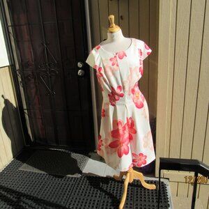 #729  NEW WOMAN 'S FLORAL DRESS BY CALVIN KLEIN  (SIZE 16W)
